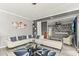 Bright living room with stylish white sofa, glass table, and modern decorations throughout at 2759 Conch Hollow Dr, Brandon, FL 33511