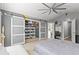 A spacious main bedroom featuring a walk-in closet and an ensuite bathroom at 2759 Conch Hollow Dr, Brandon, FL 33511