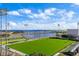 Aerial view of a stadium and a marina filled with boats on a clear, sunny day at 301 1St S St # 3207, St Petersburg, FL 33701