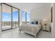Bright bedroom featuring floor-to-ceiling windows and a balcony with stunning city views at 301 1St S St # 3207, St Petersburg, FL 33701