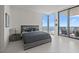 Spacious bedroom boasting floor-to-ceiling windows and a private balcony at 301 1St S St # 3207, St Petersburg, FL 33701