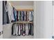Large walk-in closet featuring built-in shelving and ample storage space at 301 1St S St # 3207, St Petersburg, FL 33701