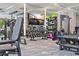 Bright, mirrored gym with various weight machines and free weights arranged neatly at 301 1St S St # 3207, St Petersburg, FL 33701