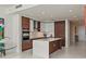 Modern kitchen with custom wood cabinets, stainless steel appliances, and a spacious center island at 301 1St S St # 3207, St Petersburg, FL 33701