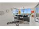 Living room with amazing water view, a unique zebra rug, and a modern light fixture at 301 1St S St # 3207, St Petersburg, FL 33701