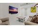Comfortable living room with a modern television, sleek furnishings, and minimalist design at 301 1St S St # 3207, St Petersburg, FL 33701