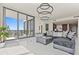 Modern living space with a view of the skyline, neutral furnishings, and open floor plan at 301 1St S St # 3207, St Petersburg, FL 33701