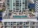 Rooftop pool deck with lounge chairs and panoramic city views from a high-rise building at 301 1St S St # 3207, St Petersburg, FL 33701