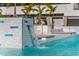 Rooftop swimming pool with sun shelf, chaise lounges and a water feature at a luxury condominium complex at 301 1St S St # 3207, St Petersburg, FL 33701