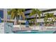 Rooftop swimming pool with sun shelf, chaise lounges and a water feature at a luxury condominium complex at 301 1St S St # 3207, St Petersburg, FL 33701