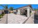 Private backyard featuring a paved patio area, BBQ, shed, and drought-tolerant landscaping at 30364 Marquette Ave, Wesley Chapel, FL 33545