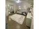 Bright bedroom with mirrored closet doors and a cozy bed, perfect for a peaceful night's sleep at 3204 W Clinton St, Tampa, FL 33614