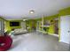 Open-concept living area features a modern aesthetic with stylish furnishings and bright, airy atmosphere at 3204 W Clinton St, Tampa, FL 33614