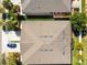 A high-angle view shows the home's roof, showcasing its design and features like dormers and vents at 32853 Woodthrush Way, Wesley Chapel, FL 33545