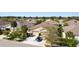 This is an aerial view of a home with a well-kept lawn and driveway, set in a neighborhood at 32853 Woodthrush Way, Wesley Chapel, FL 33545