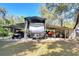 Property with RV parking and storage structures providing ample space for vehicles and equipment at 37410 Dixie Ave, Dade City, FL 33525
