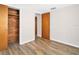 Bedroom with ample closet space and neutral decor at 3814 Sunray Dr, Holiday, FL 34691