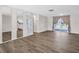 Spacious living room showcasing modern flooring and lots of natural light at 3814 Sunray Dr, Holiday, FL 34691