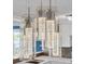 Stylish modern kitchen pendant lighting fixture with bubble glass design at 3814 Sunray Dr, Holiday, FL 34691