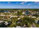 Aerial view of a cozy residential area featuring waterfront homes, mature trees and quick access to the Gulf at 3960 13Th Ne Way, St Petersburg, FL 33703