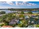 Aerial view of waterfront property featuring a pool and scenic water views at 3960 13Th Ne Way, St Petersburg, FL 33703
