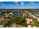 Aerial view of residential area featuring waterfront homes with docks, and scenic water views at 3960 13Th Ne Way, St Petersburg, FL 33703