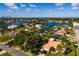 Aerial view of residential area featuring waterfront homes with pools and scenic water views at 3960 13Th Ne Way, St Petersburg, FL 33703