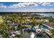Aerial view of a waterfront property featuring a private dock, pool and access to the Gulf at 3960 13Th Ne Way, St Petersburg, FL 33703