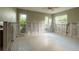 Bedroom awaiting renovation, with ample natural light from multiple windows and visible framing at 3960 13Th Ne Way, St Petersburg, FL 33703