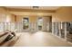 Spacious living room ready for renovation, featuring natural light from a large window and front door at 3960 13Th Ne Way, St Petersburg, FL 33703