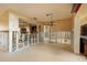 Open living area with potential, showcasing exposed framing and connections to the kitchen and dining space at 3960 13Th Ne Way, St Petersburg, FL 33703