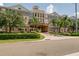 Beautiful building featuring lush landscaping and a convenient covered entrance at 4221 W Spruce St # 2205, Tampa, FL 33607