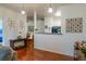 Bright living room with hardwood floors flowing into the adjacent dining area and kitchen at 4221 W Spruce St # 2205, Tampa, FL 33607