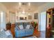 Inviting living room with hardwood floors and a peek into the modern kitchen at 4221 W Spruce St # 2205, Tampa, FL 33607