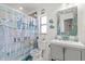 Nautical themed bathroom with turtle decor and starfish shower curtain at 5140 Kirkwood Ave, Spring Hill, FL 34608