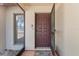 Front door with a secure lock and a storm door provides safety at 5140 Kirkwood Ave, Spring Hill, FL 34608