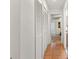 Hallway with tiled floors and closet for extra storage at 5140 Kirkwood Ave, Spring Hill, FL 34608
