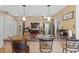 Kitchen featuring granite countertops, stainless steel appliances, pendant lighting, and breakfast bar seating at 5140 Kirkwood Ave, Spring Hill, FL 34608