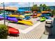 Explore the waterways with community kayaks featuring organized storage racks and a variety of colorful boats available at 6020 Shore S Blvd # 902, Gulfport, FL 33707