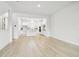 Open-concept living space showcasing the kitchen and living area with abundant natural light at 6605 N Nebraska Ave # 28, Tampa, FL 33604