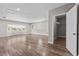 Bright bonus room with wood floors and natural light at 7401 Hancock St, Riverview, FL 33578