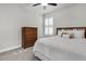 Bedroom features neutral paint, carpet, and a dresser with room for decor at 8352 Greenway Ave, Wesley Chapel, FL 33544