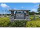 Elegant Park Meadows community sign surrounded by lush landscaping creates a welcoming entrance at 8352 Greenway Ave, Wesley Chapel, FL 33544