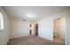 Carpeted bedroom with white walls, ensuite bathroom and walk-in closet at 8445 Calais N, Pinellas Park, FL 33781