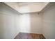 Empty walk-in closet with carpeted flooring and hanging racks at 8445 Calais N, Pinellas Park, FL 33781