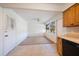 Bright eating area adjacent to kitchen, offering a cozy space for meals with natural light at 8445 Calais N, Pinellas Park, FL 33781