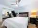 Bright main bedroom with a ceiling fan, and neutral decor at 910 Lakeside Dr, Largo, FL 33778