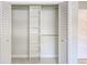 A custom closet provides maximum storage, with adjustable shelves and rods at 921 Woodland Dr, Palm Harbor, FL 34683