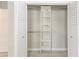 A custom closet provides maximum storage, with adjustable shelves and rods at 921 Woodland Dr, Palm Harbor, FL 34683