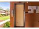 Hallway view of the elevator, emergency phone, and bulletin board with neighborhood community information at 12760 Indian Rocks Rd # 571, Largo, FL 33774
